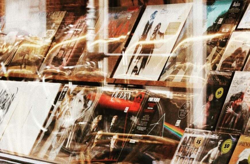 vinyl records displayed in front of a record store